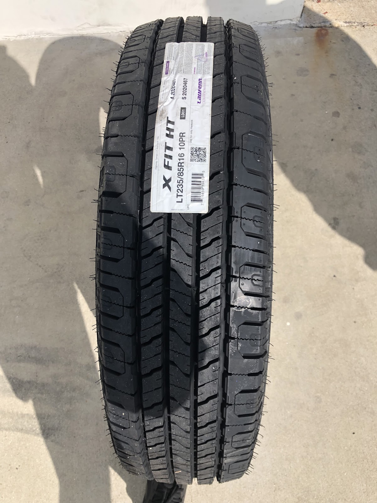 A new Laufenn X FIT HT light truck tire standing on the forecourt at Southland Automotive