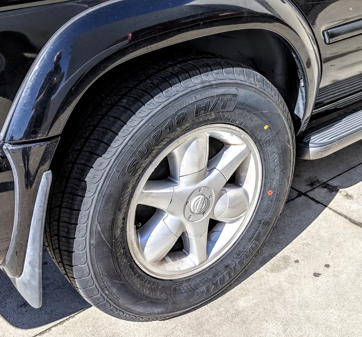 A freshly fitted wheel and tire on a customer vehicle